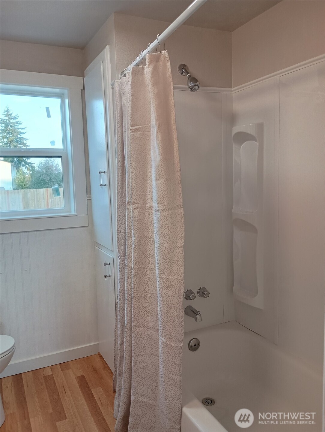 14607 Union Avenue Southwest Lakewood, WA 98498 - Photo 30 of 40 a bathroom with a shower and a toilet
