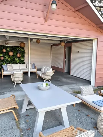a view of outdoor dining space yard and patio