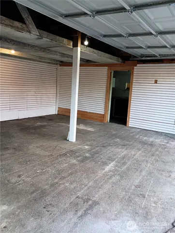 a view of an empty room with closet