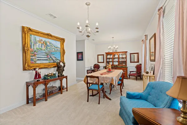 a view of a livingroom and a dining room