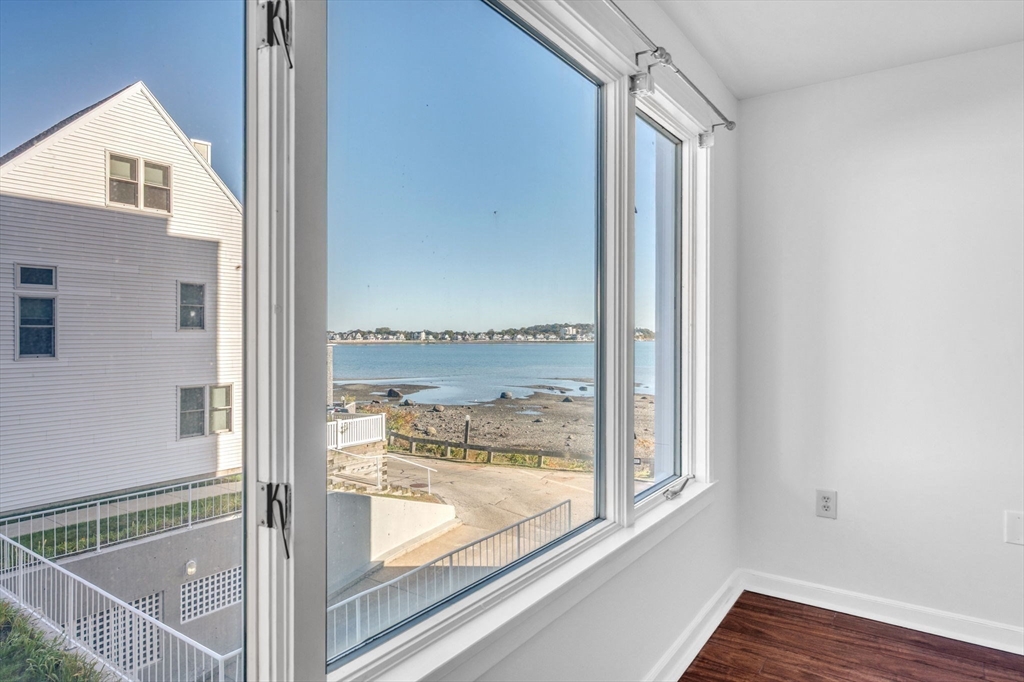 1 Commodore Court, Unit 202 Hull, MA 02045 - Photo 25 of 35 a view of a room that has a window in it