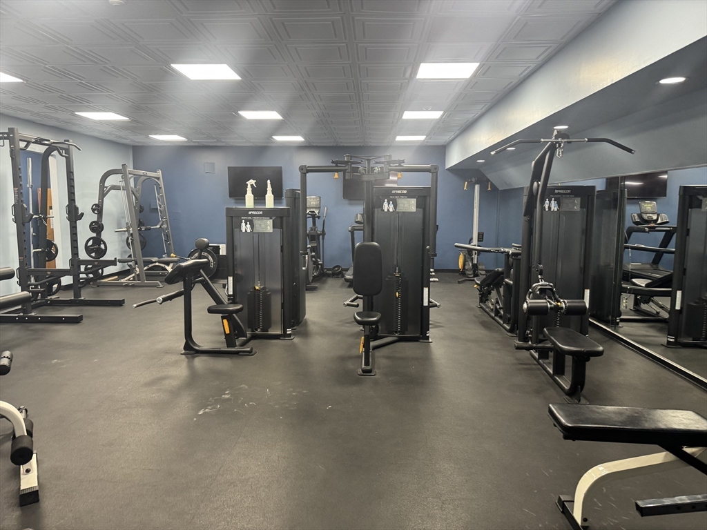 1 Commodore Court, Unit 202 Hull, MA 02045 - Photo 32 of 35 a view of a room with gym equipment