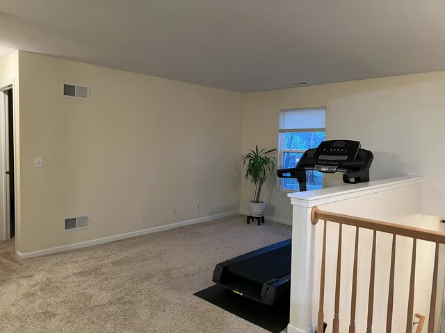 a kitchen with a stove and a refrigerator