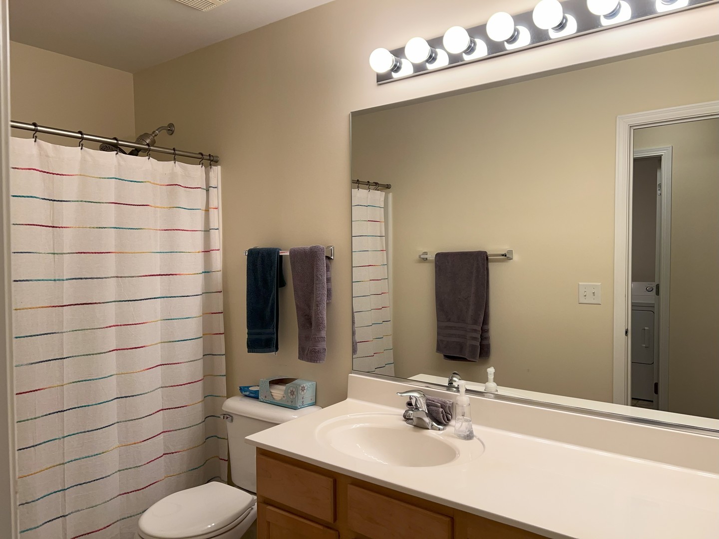 2623 Amber Court, Unit 2623 Algonquin, IL 60102 - Photo 8 of 11 a bathroom with a sink mirror and toilet