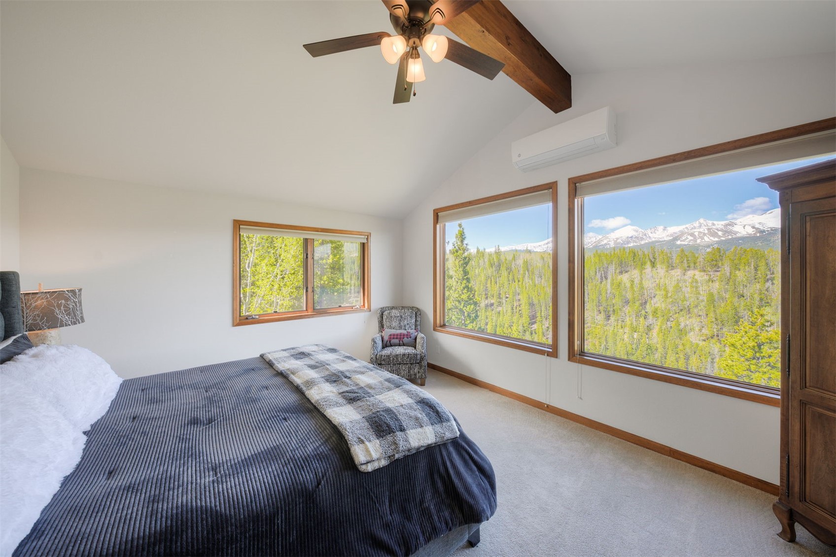 2542 Boreas Pass Road Breckenridge, CO 80424 - Photo 17 of 33 a bedroom with a large bed and a large window