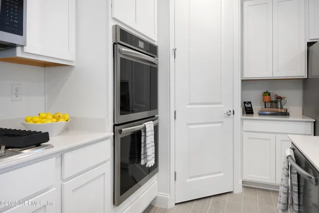 a bathroom with a shower and a sink