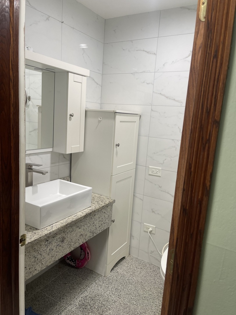 2500 Bayside Drive, Unit 3 Palatine, IL 60074 - Photo 14 of 14 a bathroom with a sink and a mirror