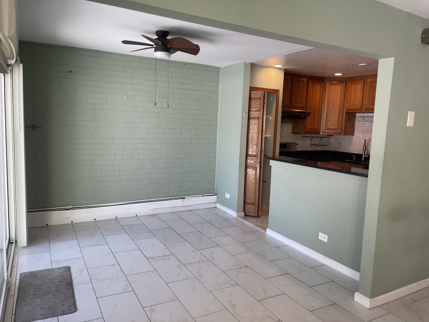 2500 Bayside Drive, Unit 3 Palatine, IL 60074 - Photo 8 of 14 a view of a kitchen with a sink and a refrigerator