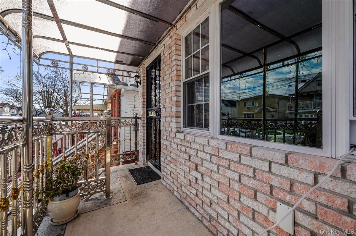 116-22 127th Street Queens, NY 11420 - Photo 2 of 18 a view of a pathway along the building