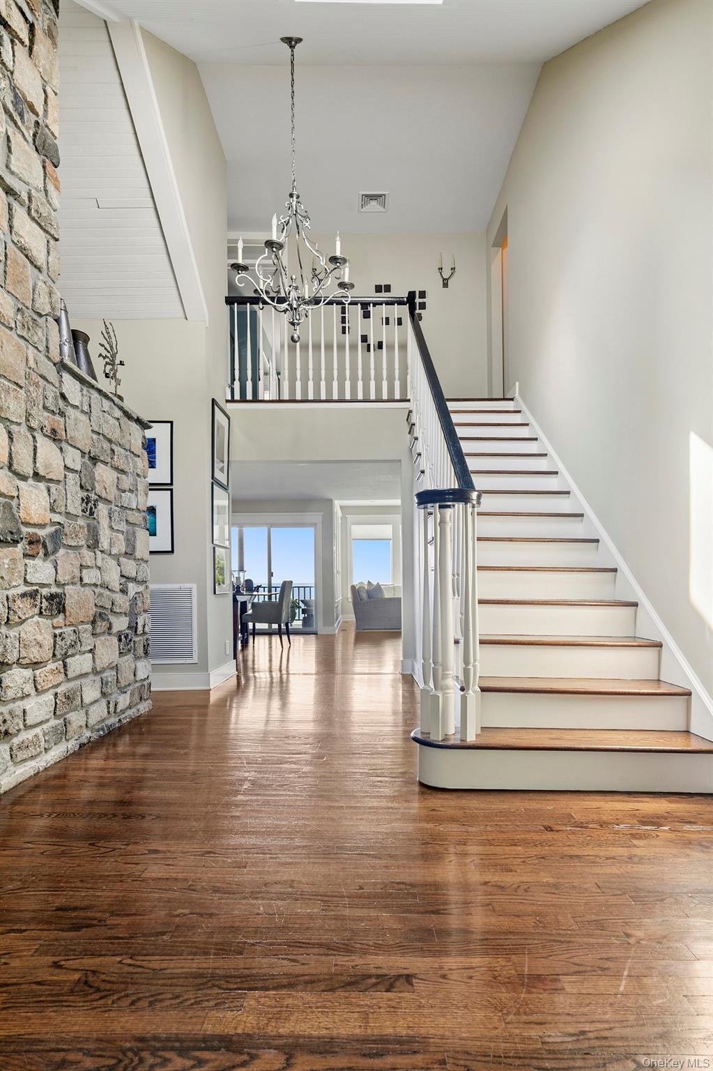 29 Bittersweet Lane Sag Harbor, NY 11963 - Photo 13 of 20 a view of entryway and hall with wooden floor