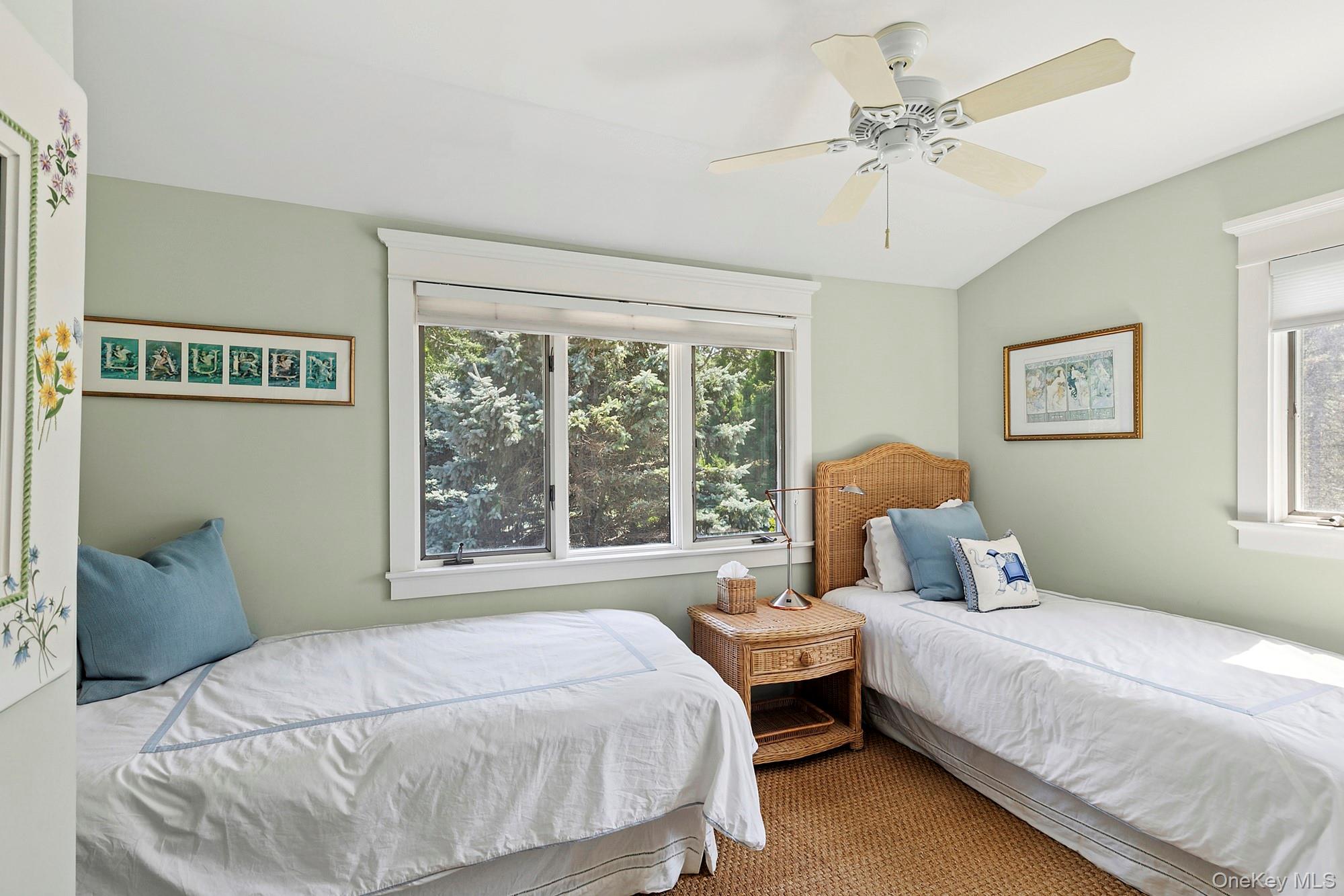 29 Bittersweet Lane Sag Harbor, NY 11963 - Photo 19 of 20 a bedroom with a bed and a window