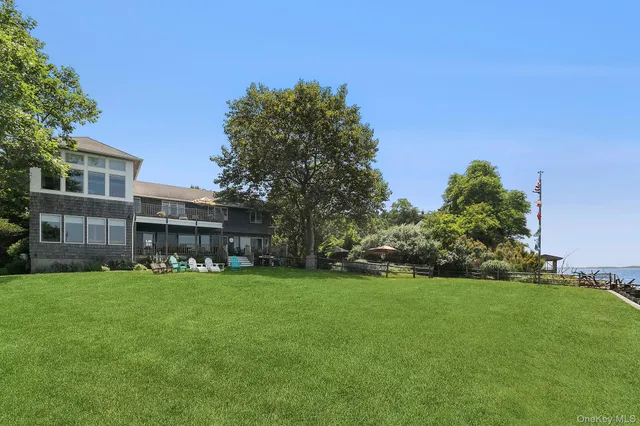 a view of a building with a yard