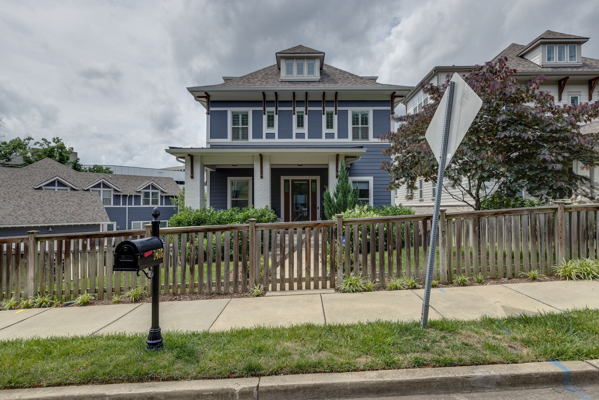 3406 Love Circle Nashville, TN 37212 - Photo 2 of 40 a view of a house with a yard in the background