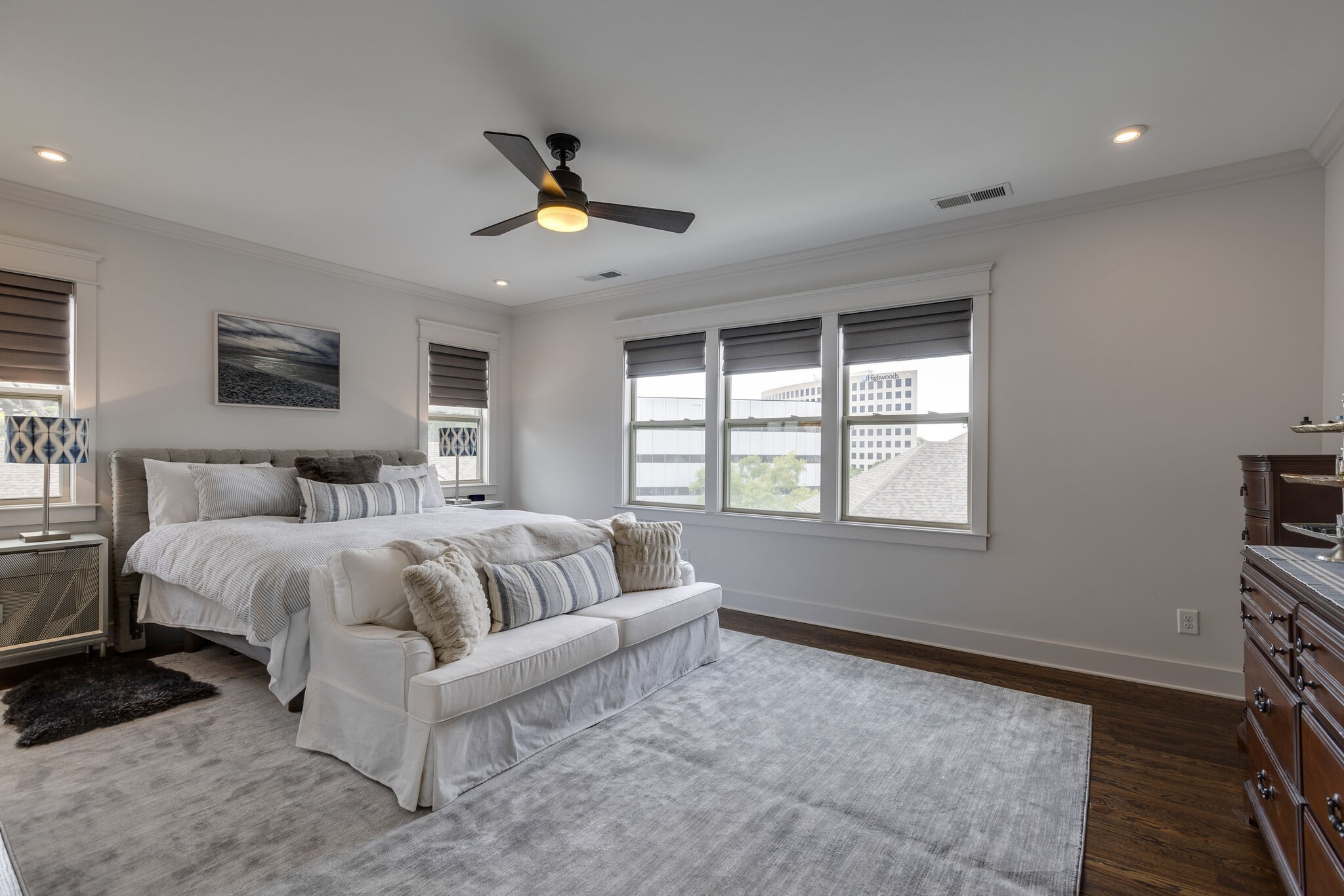 3406 Love Circle Nashville, TN 37212 - Photo 22 of 40 a spacious bedroom with a large bed and a window