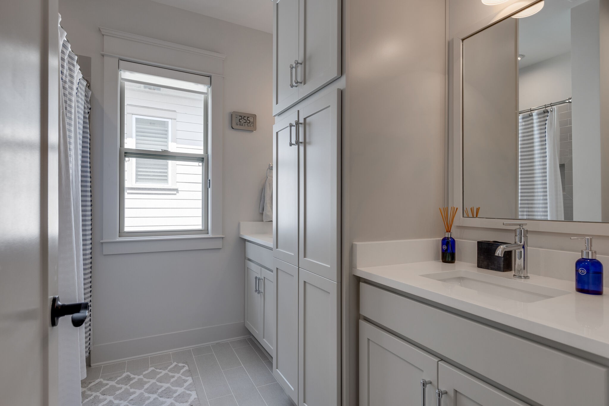 3406 Love Circle Nashville, TN 37212 - Photo 28 of 40 a bathroom with a sink and a mirror