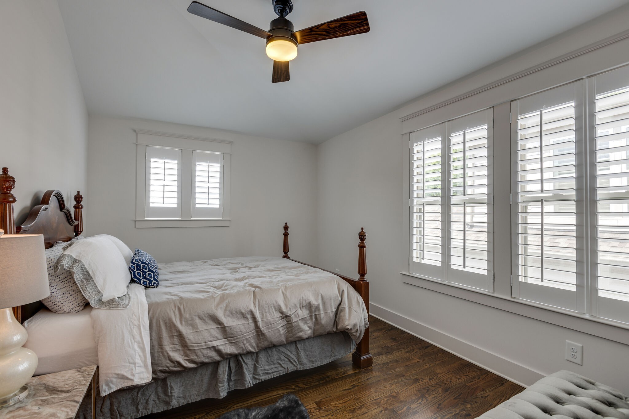 3406 Love Circle Nashville, TN 37212 - Photo 30 of 40 a bedroom with a bed and a window