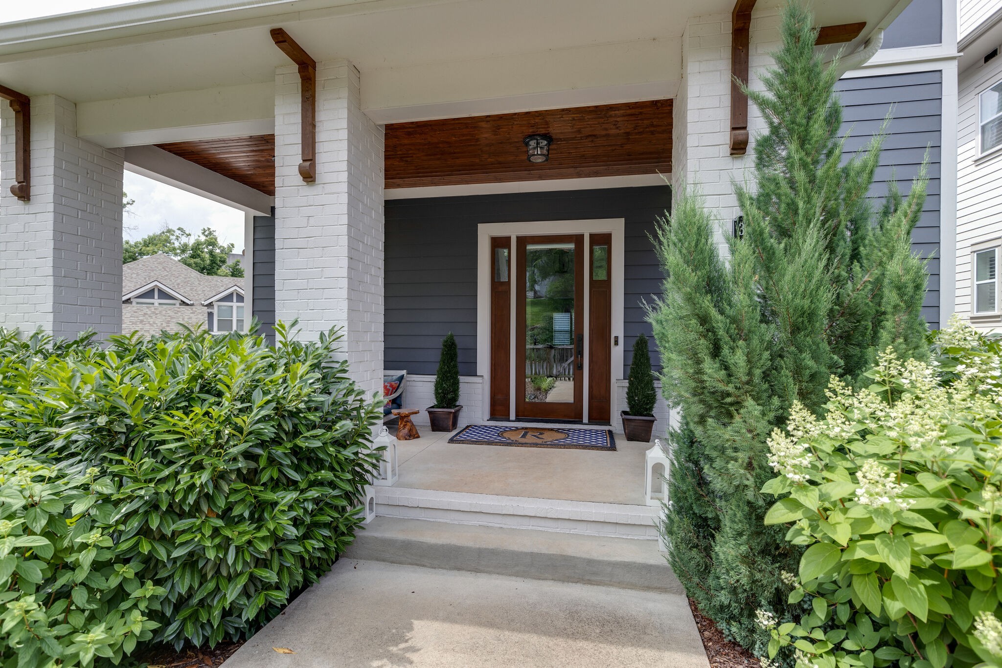 3406 Love Circle Nashville, TN 37212 - Photo 3 of 40 a view of a door of the house with potted plants