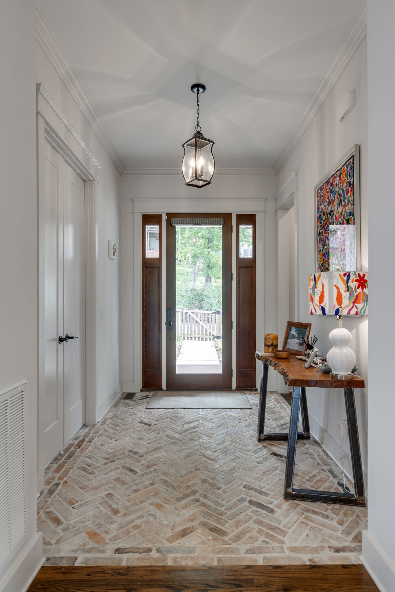 3406 Love Circle Nashville, TN 37212 - Photo 6 of 40 a view of a livingroom with furniture window and wooden floor