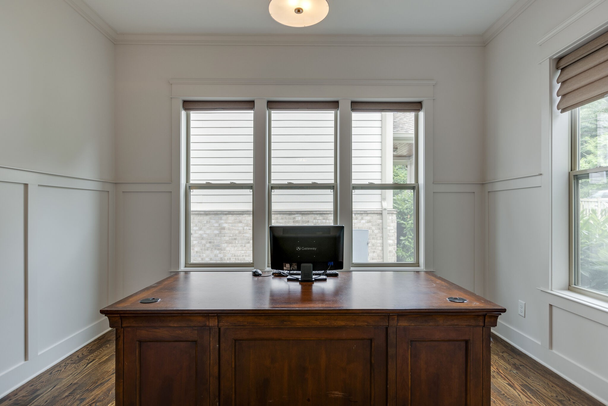 3406 Love Circle Nashville, TN 37212 - Photo 7 of 40 a view of a workspace with furniture and a window