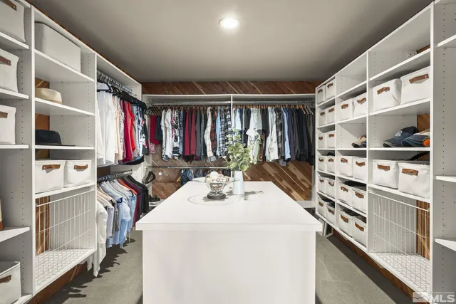 a view of kitchen with cabinets and wooden floor