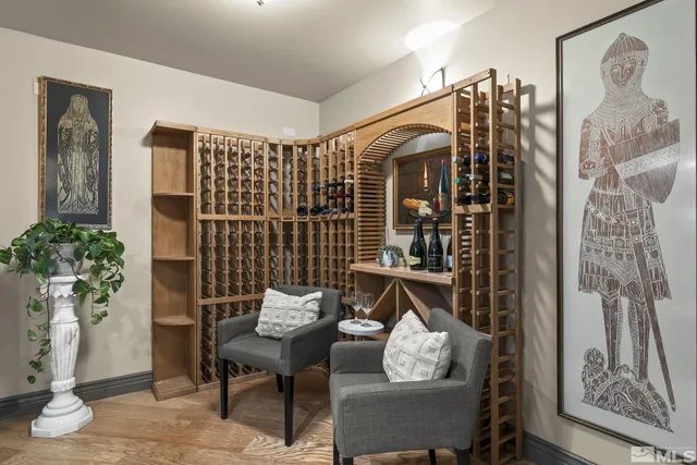 a outdoor living room with furniture and a potted plant