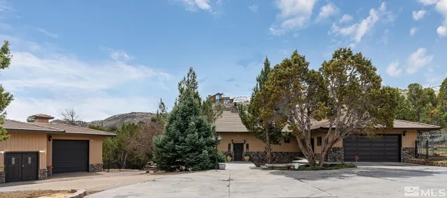 a view of a street with a building in the background