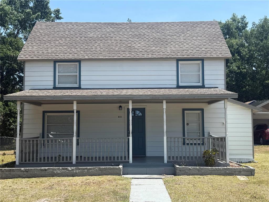 a front view of a house with garage