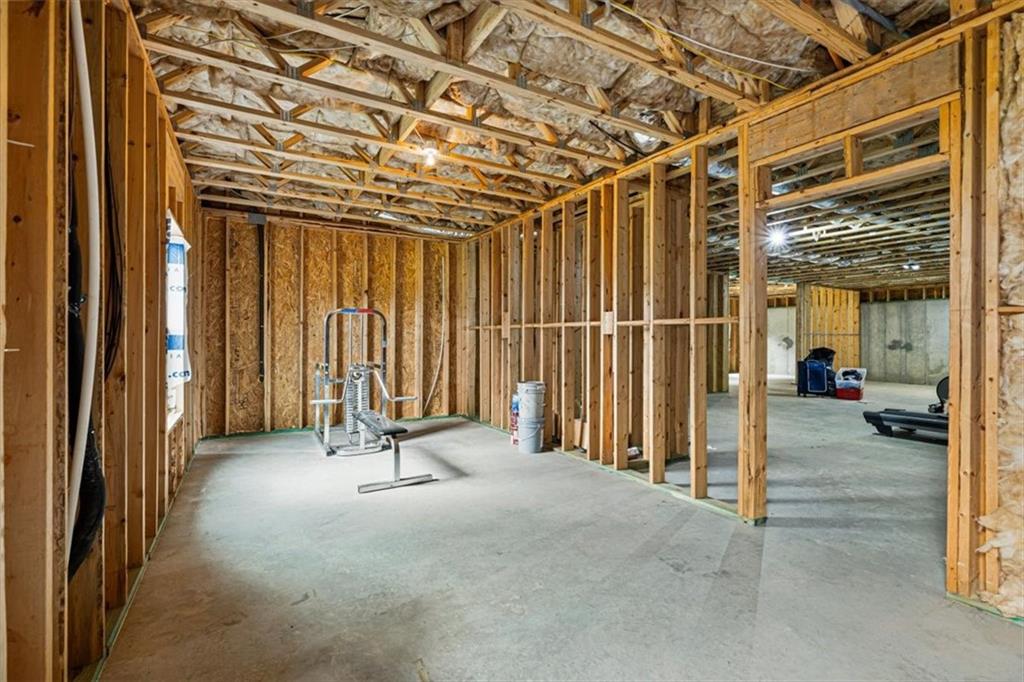 947 Hunter Way Milton, GA 30004 - Photo 75 of 78 a view of a room with wooden walls
