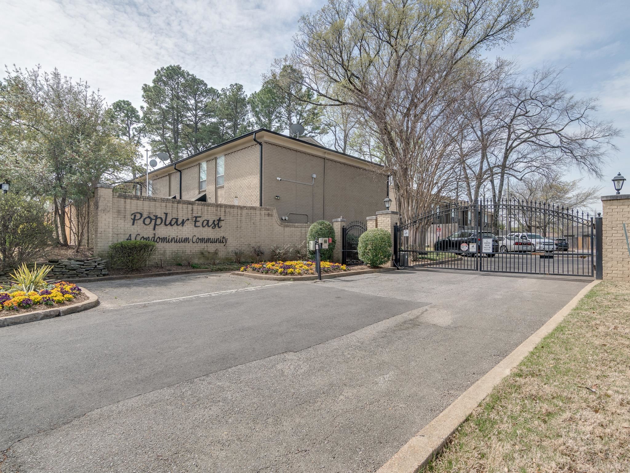 971 June Road, Unit 7 Memphis, TN 38119 - Photo 1 of 23 Exterior space with street lights, a gated entry, a gate, and curbs