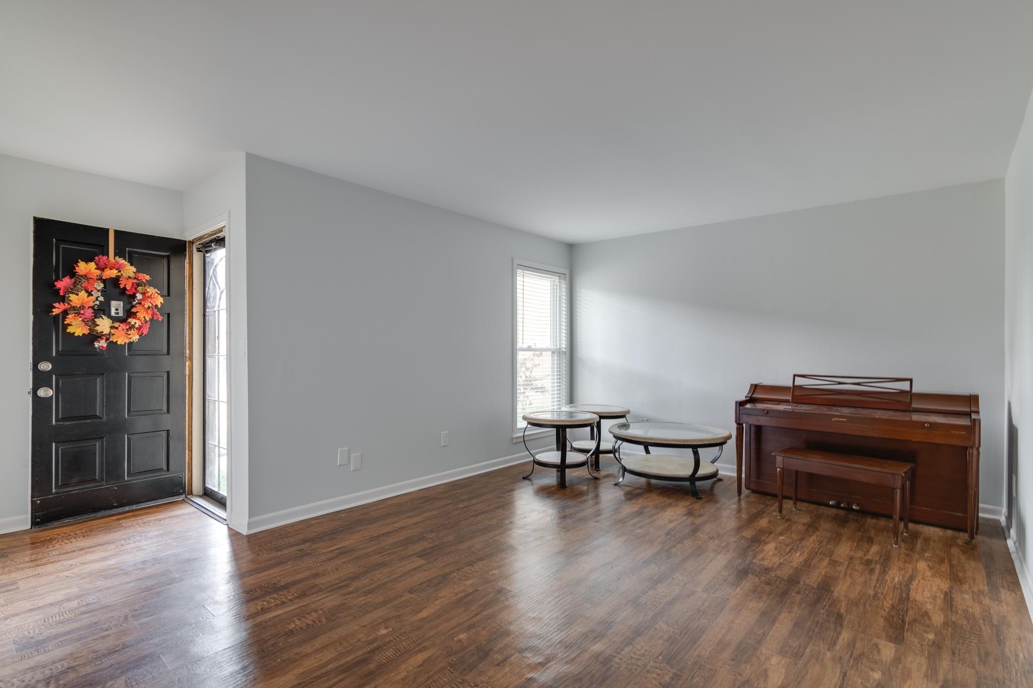 971 June Road, Unit 7 Memphis, TN 38119 - Photo 3 of 23 Living area with baseboards and wood finished floors
