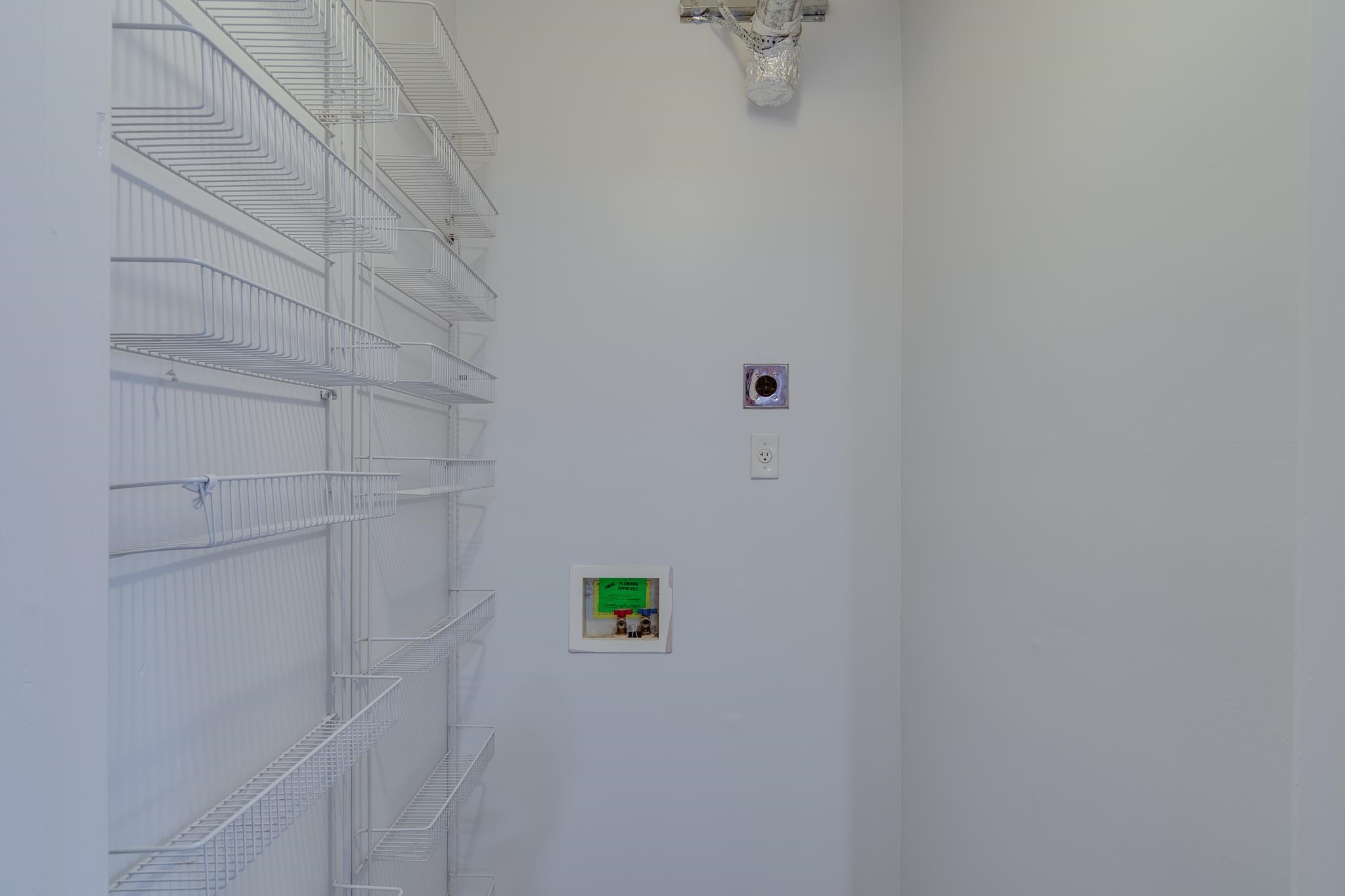 971 June Road, Unit 7 Memphis, TN 38119 - Photo 8 of 23 Laundry room featuring electric dryer hookup, hookup for a washing machine, and laundry area