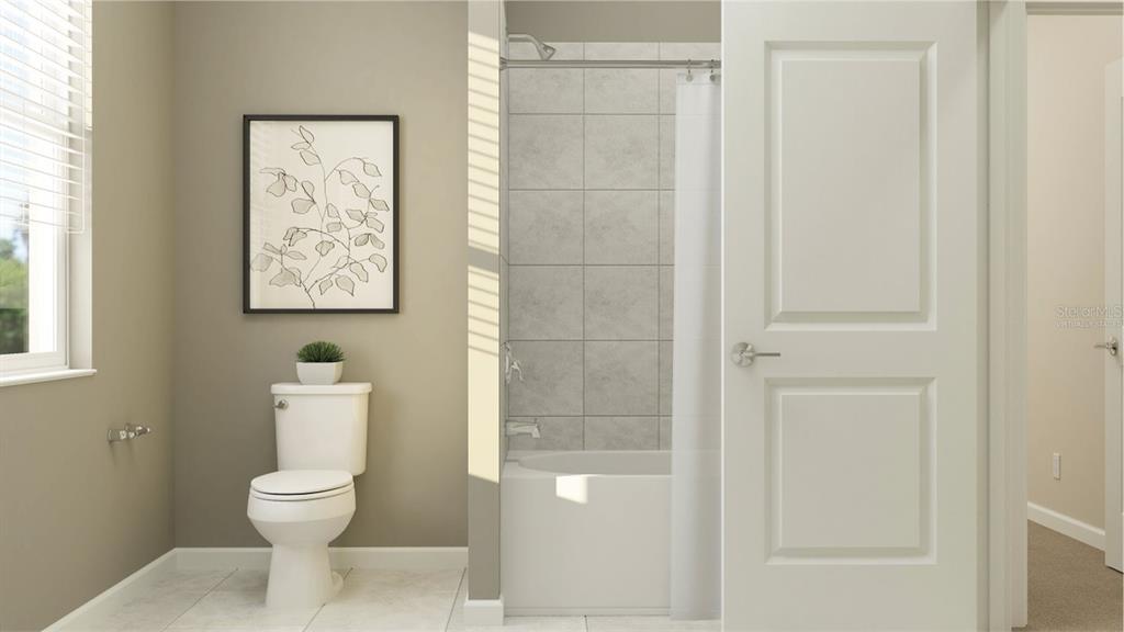 1672 Rider Rain Lane Apopka, FL 32703 - Photo 9 of 24 a bathroom with a toilet