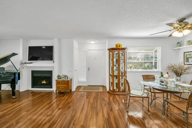 a view of a livingroom with furniture and a fireplace