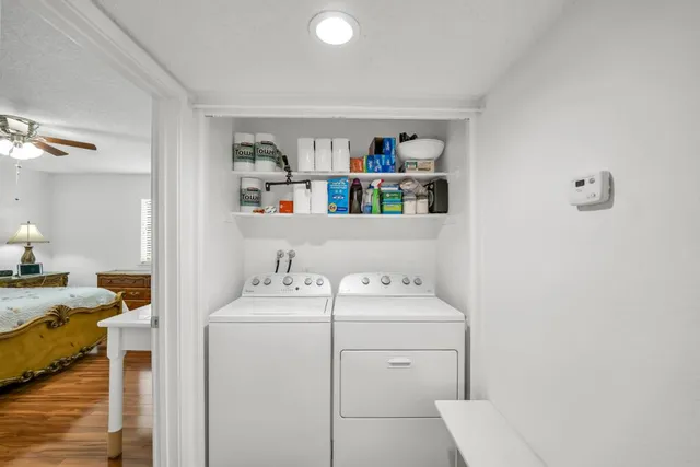 a utility room with dryer and washer