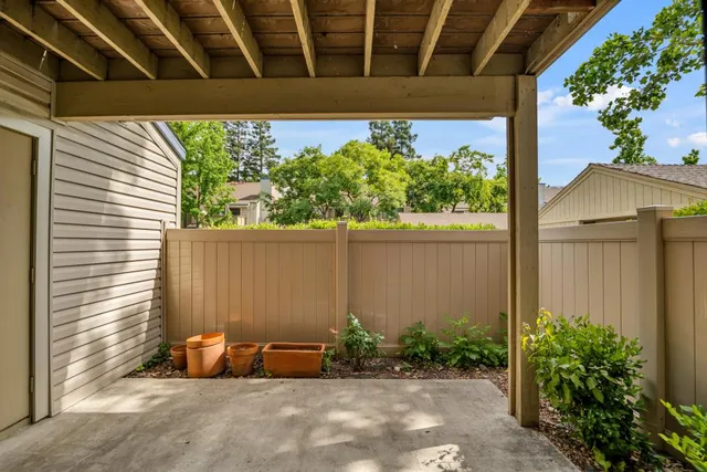 a view of a porch with a bench