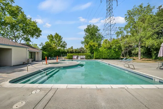 a house with trees in front of it