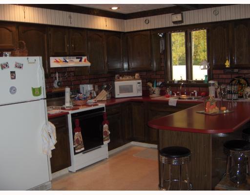 283 Isthmus Road Rumford, ME 04276 - Photo 7 of 31 Exterior Front. Kitchen in main part...