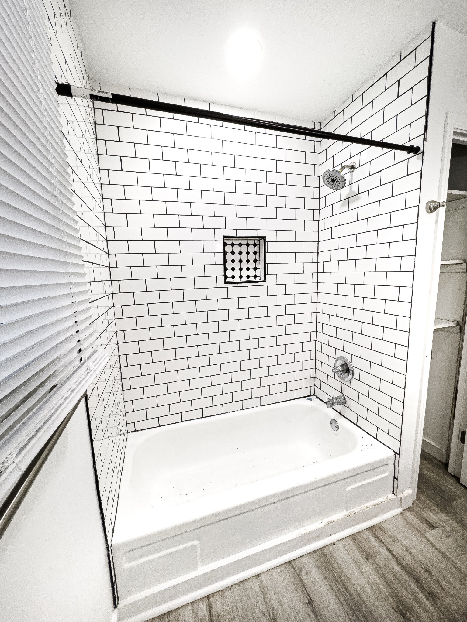 1307 Jarrett Drive Springfield, TN 37172 - Photo 12 of 20 a bathroom with a bathtub and shower