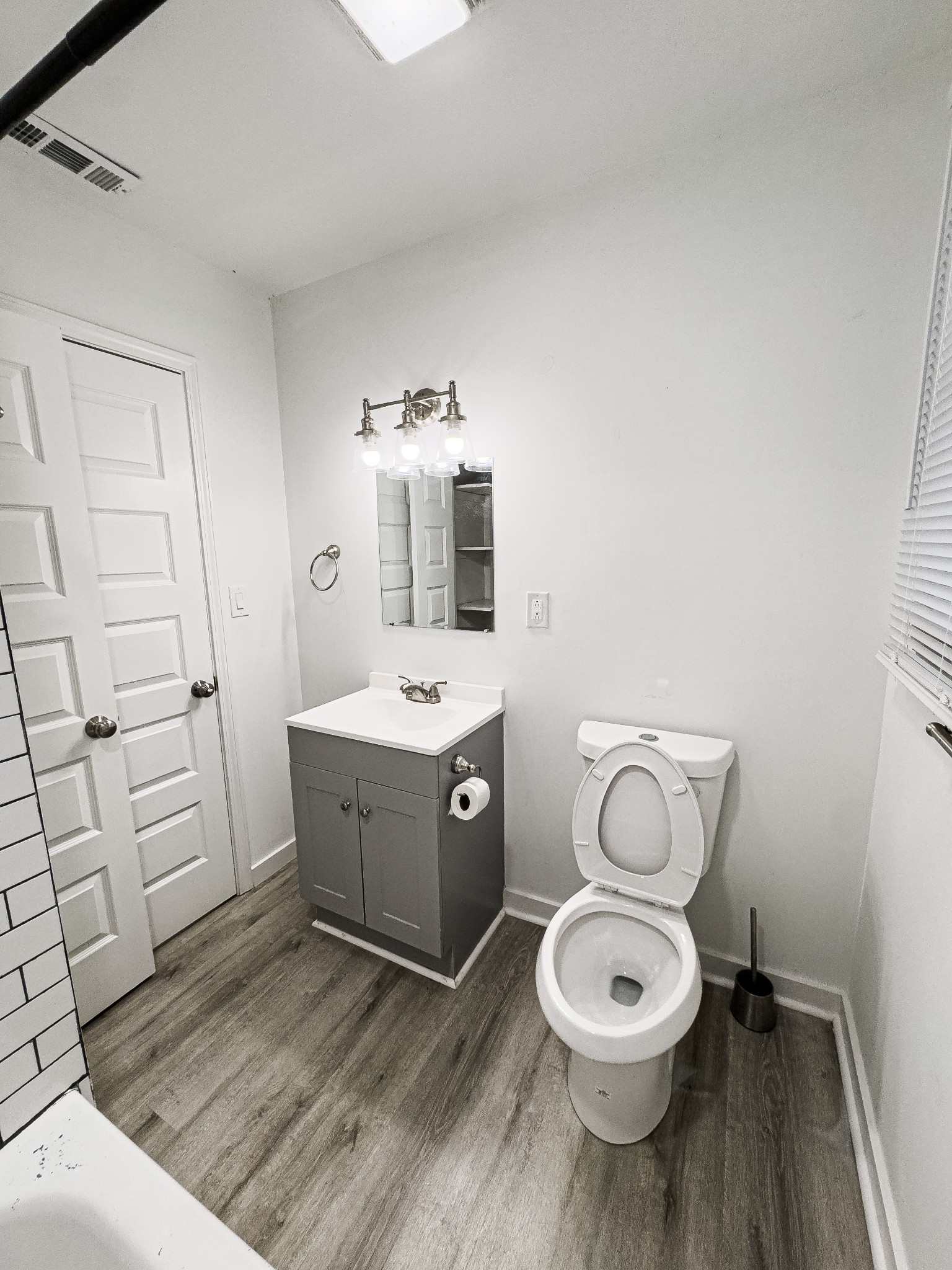 1307 Jarrett Drive Springfield, TN 37172 - Photo 16 of 20 a spacious bathroom with a toilet sink and mirror
