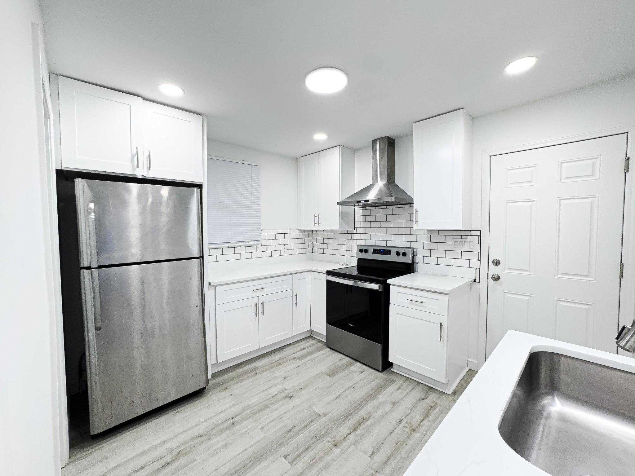 1307 Jarrett Drive Springfield, TN 37172 - Photo 6 of 20 a kitchen with granite countertop a refrigerator stove top oven and sink
