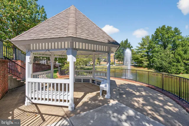 a view of a lake with a building in the background