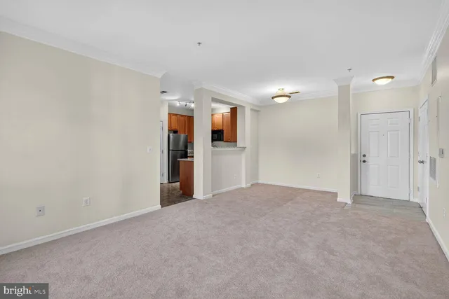 a view of a big room with windows and cabinet