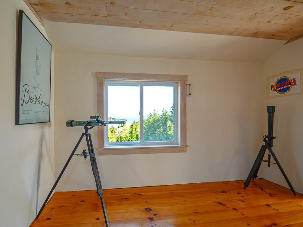 49 Atlantic Road Swans Island, ME 04685 - Photo 24 of 33 Hallway alcove with lovely views.