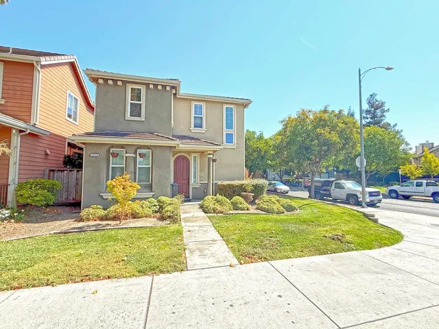 a view of a house with swimming pool