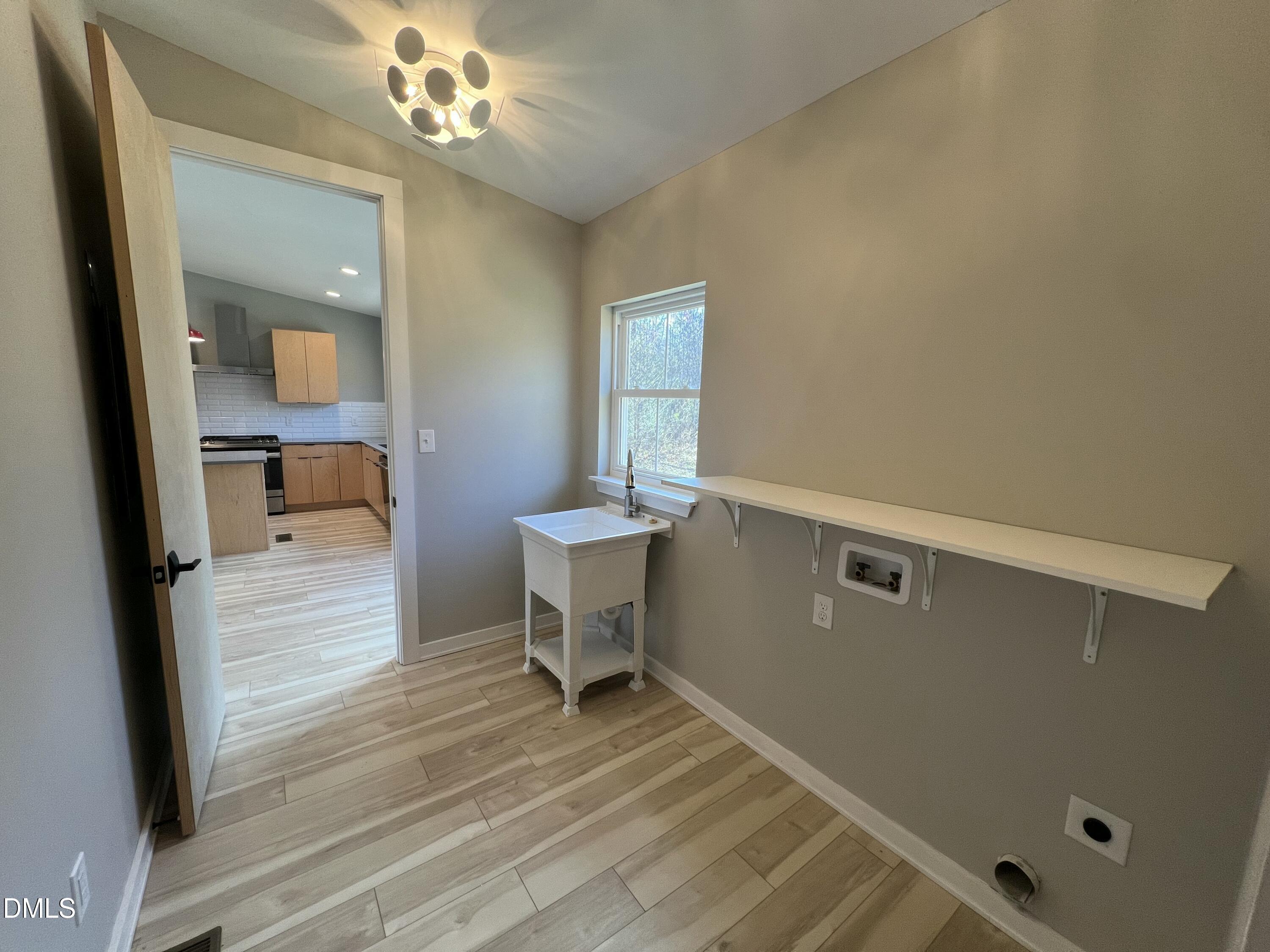 5470 Thom Road Mebane, NC 27302 - Photo 20 of 26 Laundry into kitchen
