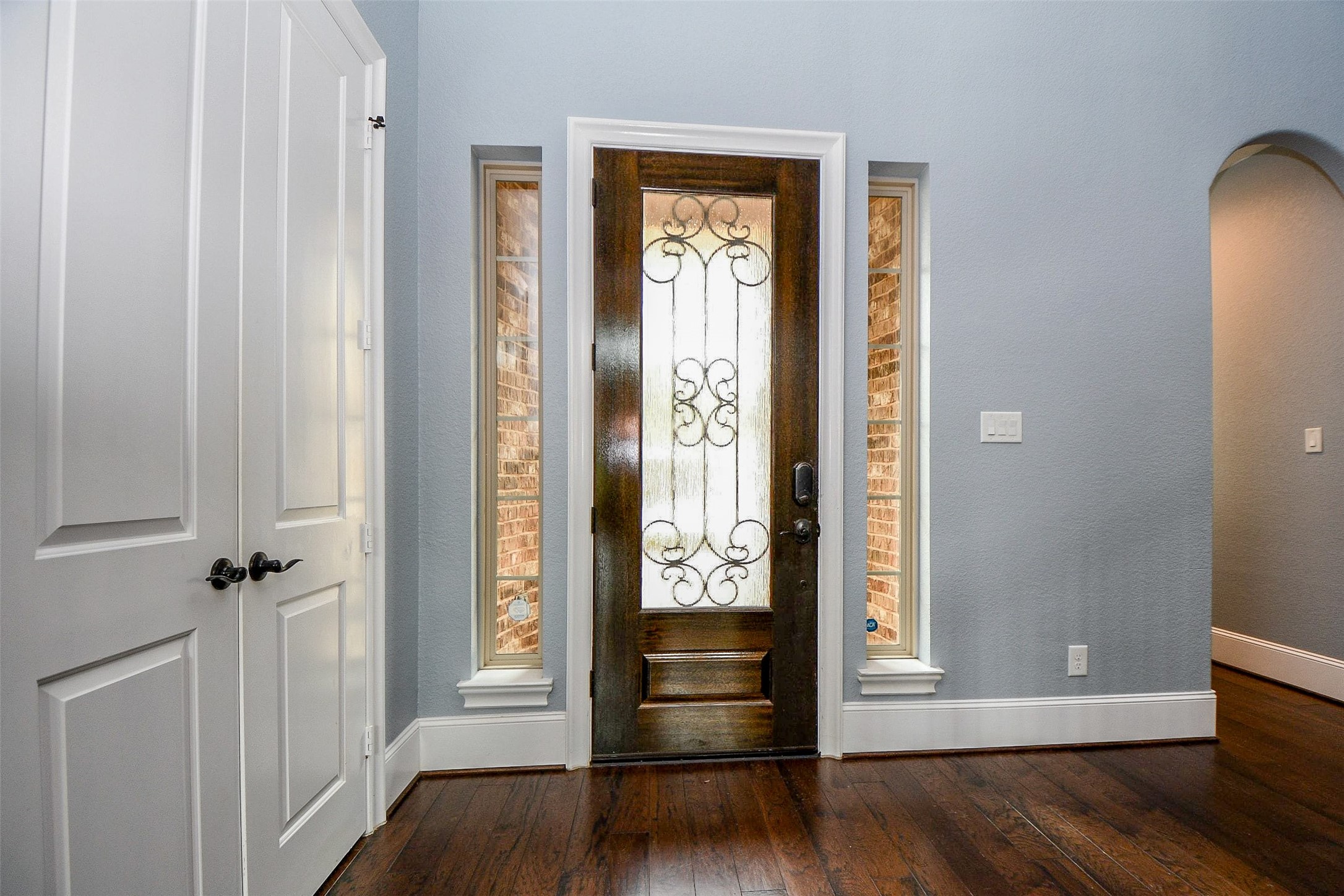 24914 Bay Mist Ridge Lane Katy, TX 77494 - Photo 5 of 50 Soothing wall tones fill this inside view of the main entry, highlighting the lovely, etched glass front door.