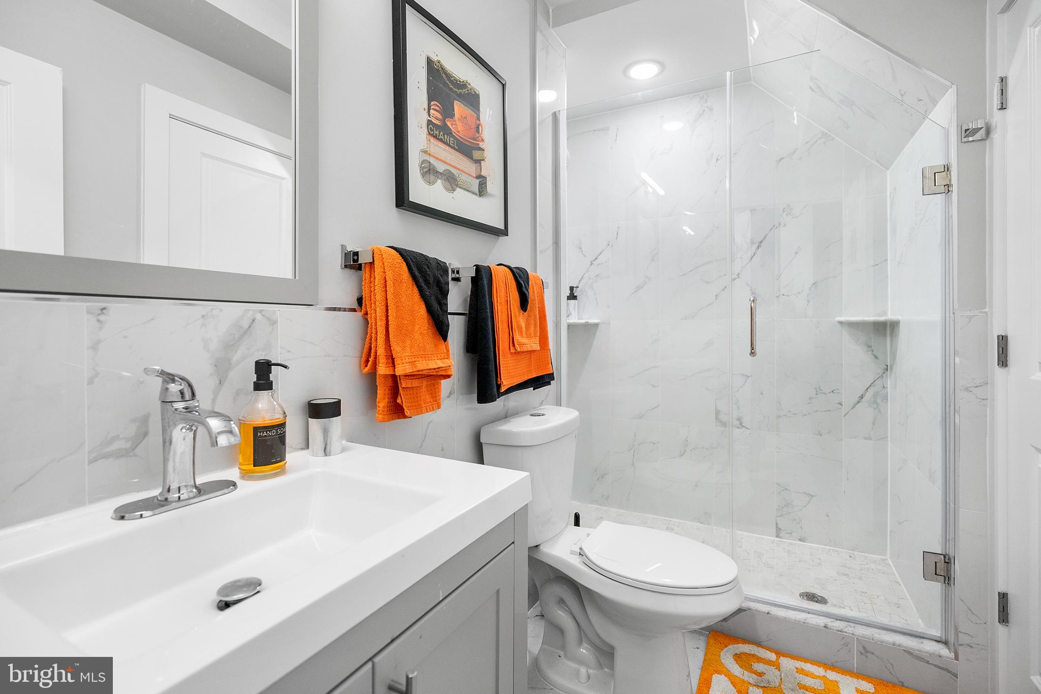 1924 North 6th Street, Unit 2 Philadelphia, PA 19122 - Photo 15 of 15 a bathroom with a sink toilet and shower