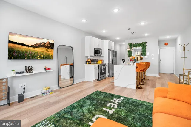 a view of bathroom with a sink and a window