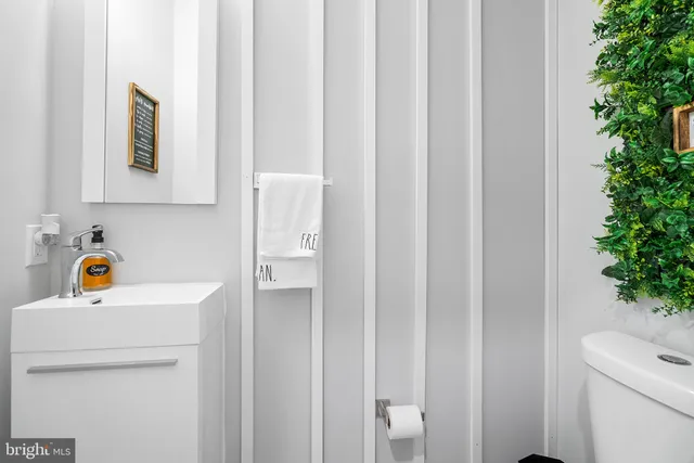 a view of a house with wooden deck