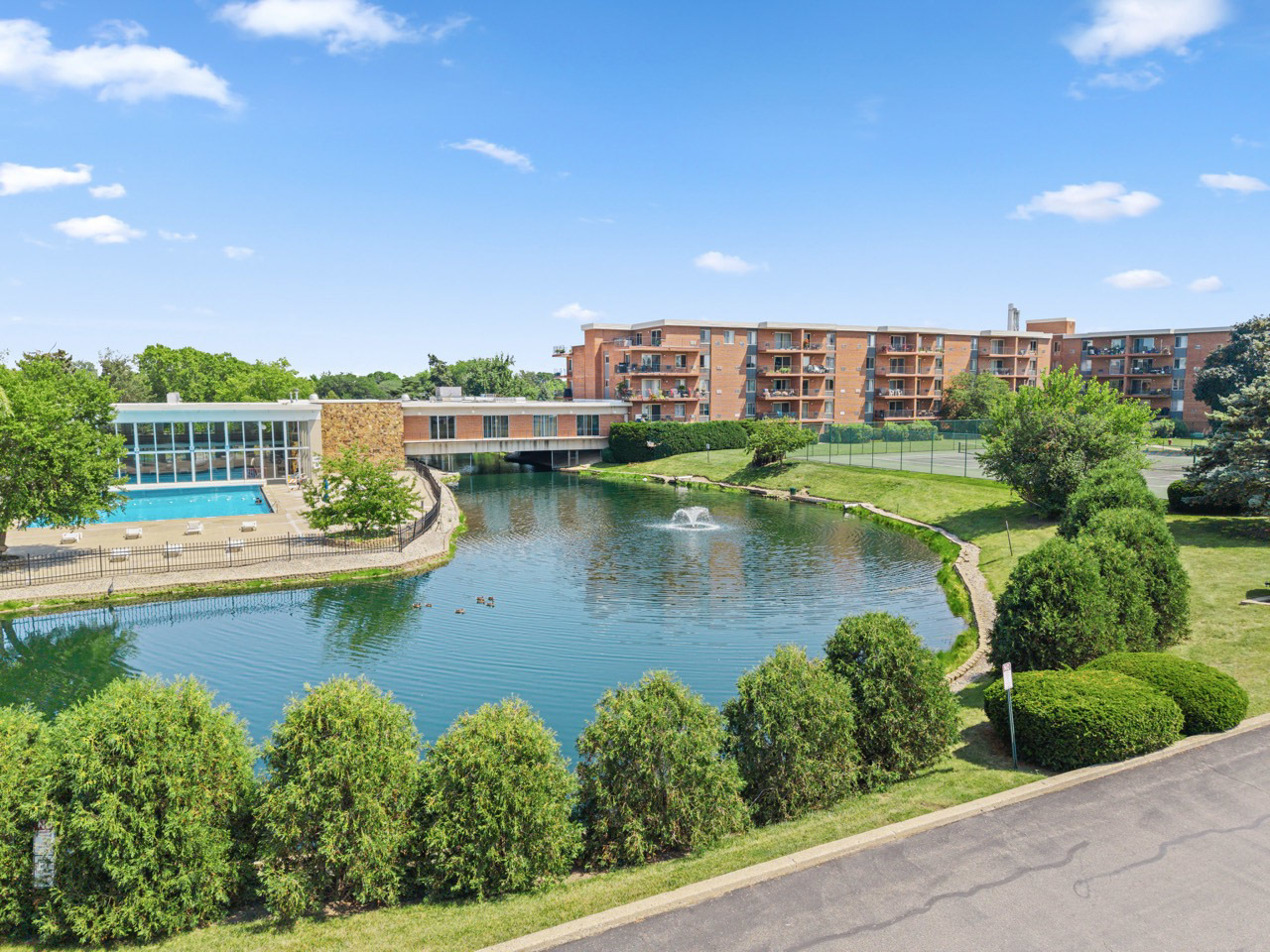 16 East Old Willow Road, Unit 424S Prospect Heights, IL 60070 - Photo 20 of 24 a view of a lake with a building in front of it